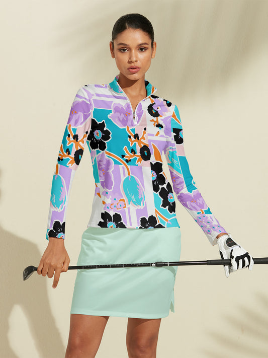 Camiseta de golf tropical vibrante de tacto sedoso con cremallera 1/4 UPF50+