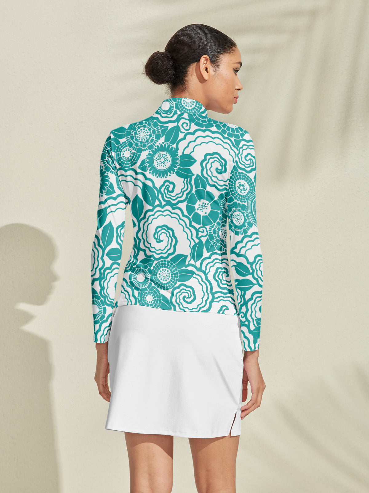 Golf shirt Hyped-up Tropical in tessuto setoso con zip a un quarto e UPF50+