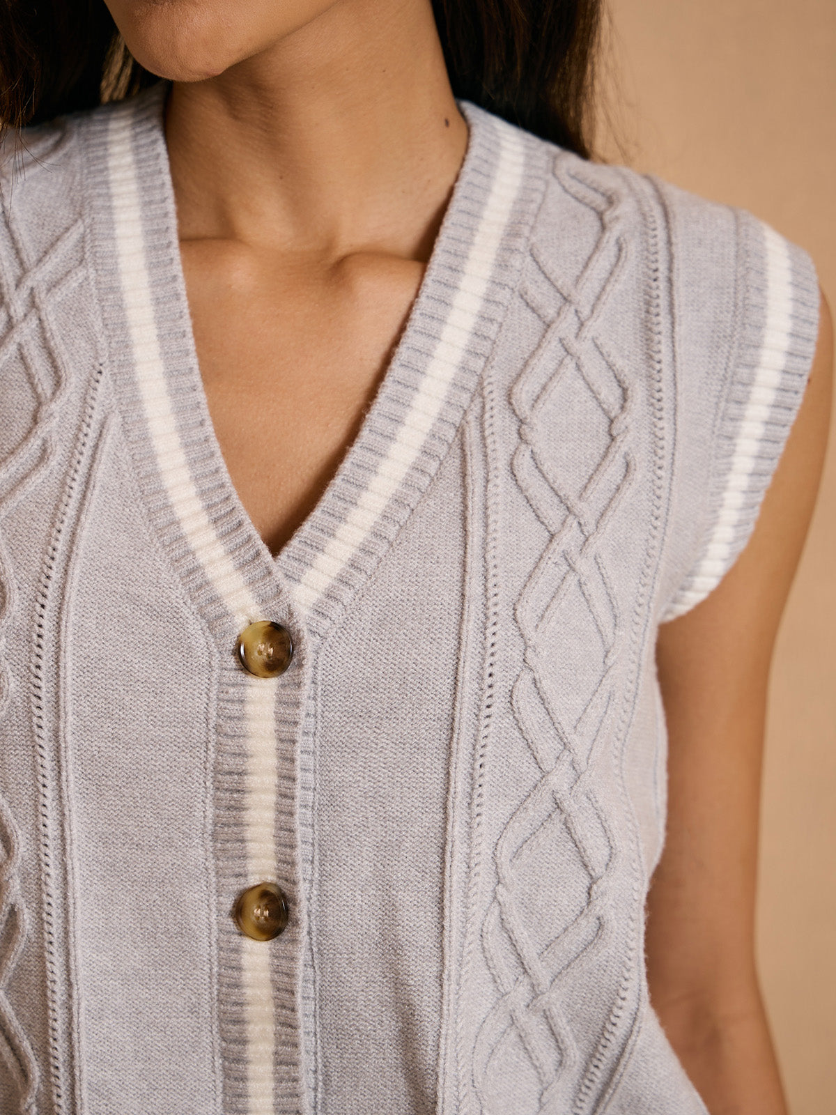 More Than Basic Sleeveless Cable Knit Cardigan