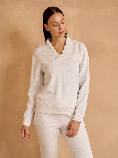 Felpa UltraSoft a maniche lunghe con volant e scollo a V