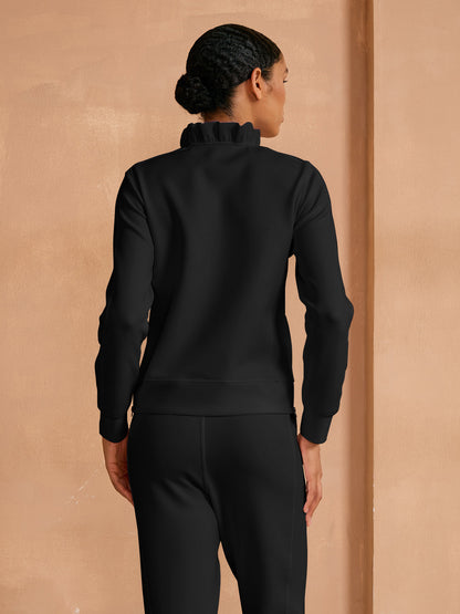 Bluza golfowa More Than Basic z falbanką przy kołnierzu