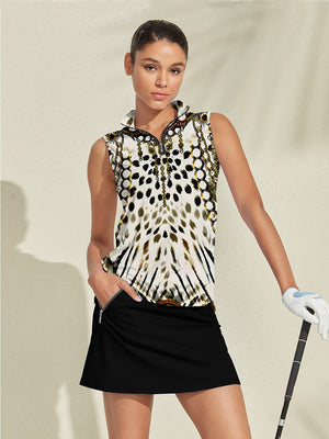 Woman in patterned sleeveless golf top and black golf skirt holding a club